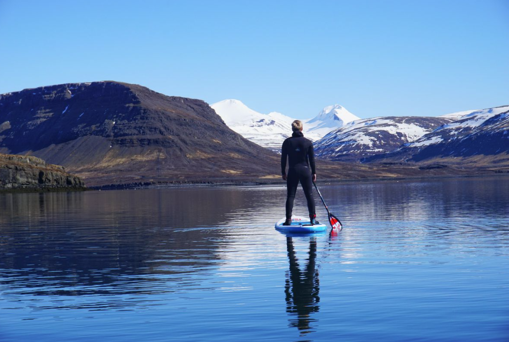 Paddle is a water sport in Iceland for summer