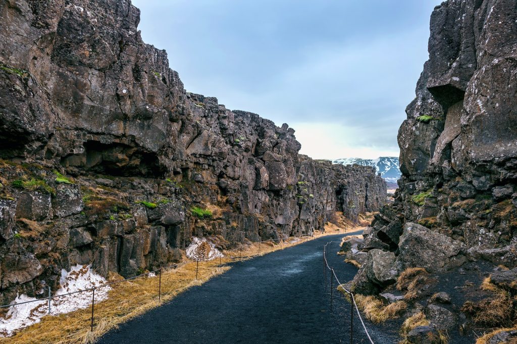 you can walk between the two contentions if you visit the Thingvellir national park in Iceland 