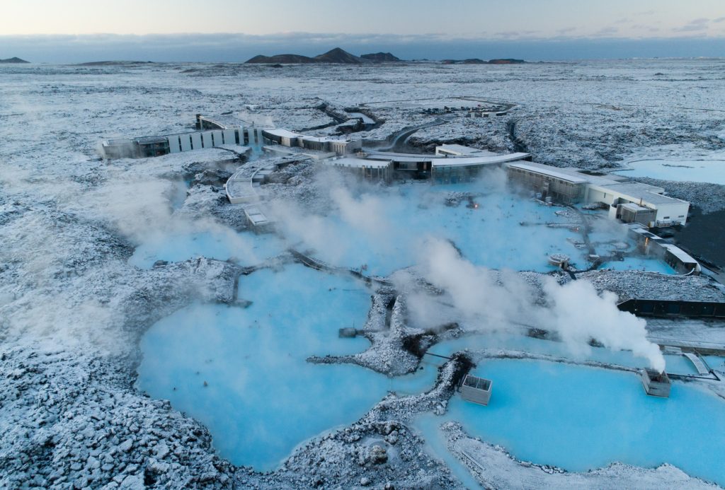 enjoy the blue lagoon and other geothermal hot springs in Iceland in December