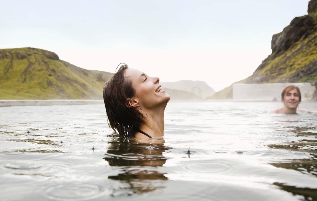 enjoy the hot spring in Iceland is one of the best thing to do in October