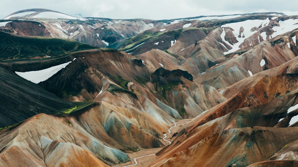 you can see a view of blue peaks at Iceland hightland