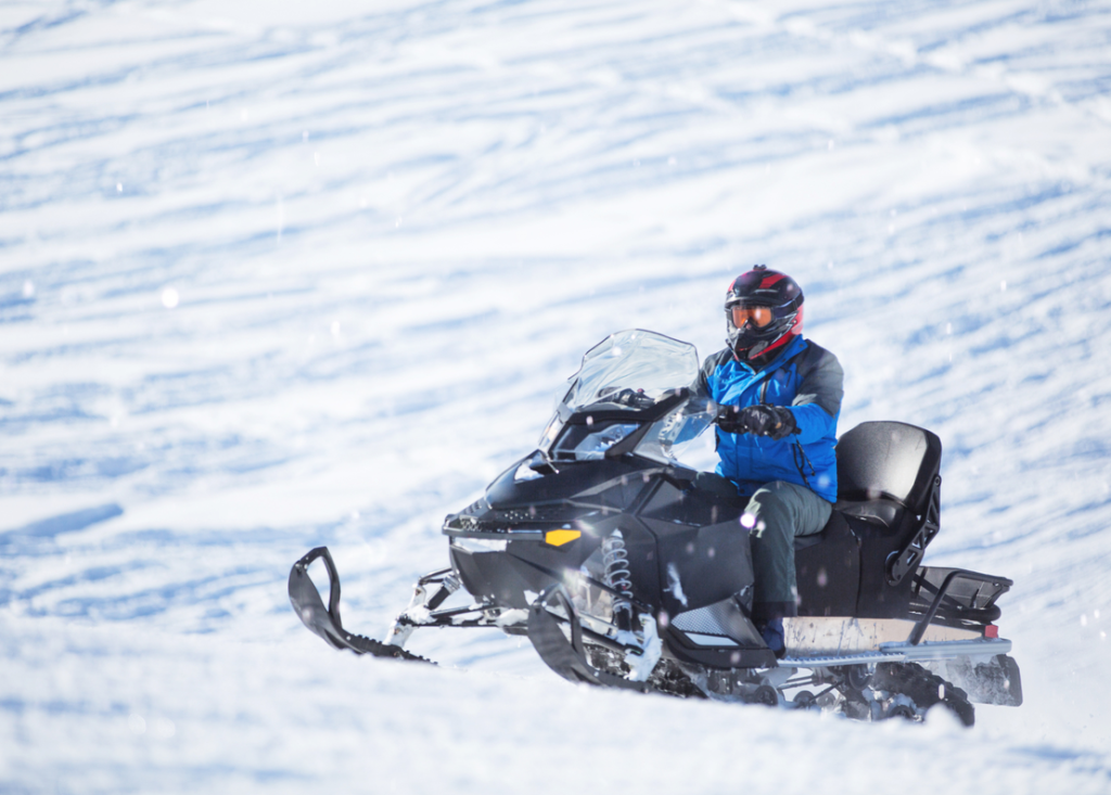 snow moiling when visiting golden circle