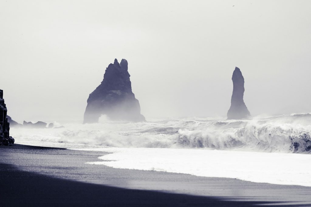 the waves at the black sand beach