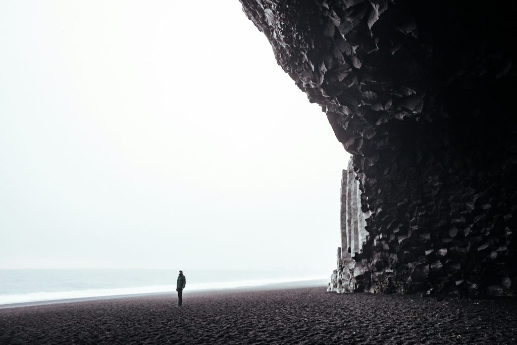 visit the black sand beach in Iceland